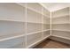 Large walk-in pantry with ample shelving at 21259 E Sparrow Dr, Queen Creek, AZ 85142