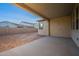 Covered patio with backyard access and views of neighborhood at 21259 E Sparrow Dr, Queen Creek, AZ 85142