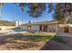Backyard oasis with sparkling pool and patio at 2664 W Ocaso Cir, Mesa, AZ 85202