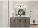 Updated bathroom with double vanity and marble countertop at 2664 W Ocaso Cir, Mesa, AZ 85202