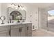 Modern bathroom with double vanity and marble shower at 2664 W Ocaso Cir, Mesa, AZ 85202