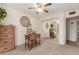 Bedroom with wood dresser and mirrored closet doors at 2664 W Ocaso Cir, Mesa, AZ 85202