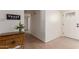 Bright entryway with tiled floors and decorative console table at 2664 W Ocaso Cir, Mesa, AZ 85202