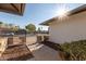 Front entry with a walkway and wrought iron gate at 2664 W Ocaso Cir, Mesa, AZ 85202