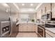 Updated kitchen, featuring stainless steel appliances at 2664 W Ocaso Cir, Mesa, AZ 85202
