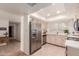 Modern kitchen with stainless steel appliances and light cabinets at 2664 W Ocaso Cir, Mesa, AZ 85202
