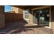 Covered patio with brick pavers and access to the interior at 2759 E Mews Rd, Gilbert, AZ 85298