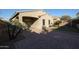 Landscaped backyard with artificial turf and patio at 2759 E Mews Rd, Gilbert, AZ 85298