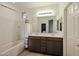Bathroom with double vanity, tub, and shower at 2759 E Mews Rd, Gilbert, AZ 85298