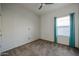 Bedroom with carpet, window with blinds, and teal curtains at 2759 E Mews Rd, Gilbert, AZ 85298