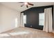 Bedroom with carpet, dark blue accent wall, and window coverings at 2759 E Mews Rd, Gilbert, AZ 85298