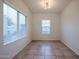 Bright dining room with tile floors and window blinds at 2759 E Mews Rd, Gilbert, AZ 85298