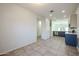 Open dining area with view into kitchen at 2759 E Mews Rd, Gilbert, AZ 85298