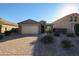 Single-story home with a two-car garage and landscaped front yard at 2759 E Mews Rd, Gilbert, AZ 85298