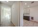 View of kitchen and living room from hallway at 2759 E Mews Rd, Gilbert, AZ 85298