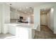 Modern kitchen with an island and white cabinets at 2759 E Mews Rd, Gilbert, AZ 85298