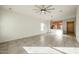 Living area with tile floors, kitchen access, and natural light at 2759 E Mews Rd, Gilbert, AZ 85298