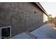Side yard with concrete pathway and exterior wall at 2759 E Mews Rd, Gilbert, AZ 85298