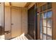 Condo entry with exterior door and storage closet at 4901 S Calle Los Cerros Dr # 241, Tempe, AZ 85282