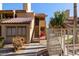 Exterior view of condo building with stairs and gated entry at 4901 S Calle Los Cerros Dr # 241, Tempe, AZ 85282