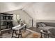 Virtually staged loft bedroom with built-in shelving and workspace at 4901 S Calle Los Cerros Dr # 241, Tempe, AZ 85282