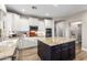 Bright kitchen featuring white cabinets, granite countertops, and stainless steel appliances at 4939 W Jomax Rd, Phoenix, AZ 85083