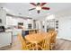 Bright kitchen with white cabinets, a large island, and stainless steel appliances at 4939 W Jomax Rd, Phoenix, AZ 85083