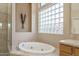 Oval soaking tub and walk-in shower at 5037 E Sleepy Ranch Rd, Cave Creek, AZ 85331