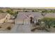 Single-story home with two-car garage and desert landscaping at 5037 E Sleepy Ranch Rd, Cave Creek, AZ 85331