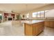 Spacious kitchen with island and oak cabinets at 5037 E Sleepy Ranch Rd, Cave Creek, AZ 85331