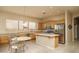 Kitchen with island, stainless steel appliances, and ample cabinet space at 5037 E Sleepy Ranch Rd, Cave Creek, AZ 85331