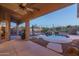 Inviting backyard pool with waterfall feature at 5037 E Sleepy Ranch Rd, Cave Creek, AZ 85331