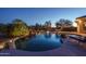 Inviting backyard pool with waterfall feature at 5037 E Sleepy Ranch Rd, Cave Creek, AZ 85331