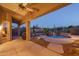 Inviting backyard pool with waterfall feature at 5037 E Sleepy Ranch Rd, Cave Creek, AZ 85331