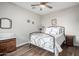 Bedroom with wood floors and an ornate bed frame at 5640 W Victory Way, Florence, AZ 85132