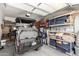 Garage with golf cart and storage shelves at 5640 W Victory Way, Florence, AZ 85132