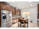Eat-in kitchen with stainless steel appliances and lots of cabinet storage at 5640 W Victory Way, Florence, AZ 85132
