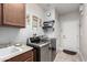 Laundry room with washer, dryer, and sink at 5640 W Victory Way, Florence, AZ 85132