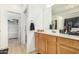 Bathroom with walk-in shower, vanity, and linen closet at 6416 E Hacienda La Noria Ln, Gold Canyon, AZ 85118