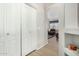 Hallway with closet and view into living room at 6416 E Hacienda La Noria Ln, Gold Canyon, AZ 85118