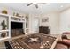 Spacious living room with southwestern decor and built-in shelving at 6416 E Hacienda La Noria Ln, Gold Canyon, AZ 85118
