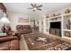 Spacious living room with southwestern decor and built-in shelving at 6416 E Hacienda La Noria Ln, Gold Canyon, AZ 85118
