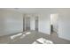 Well-lit bedroom with en-suite bathroom and walk-in closet at 6934 W Mclellan Rd, Glendale, AZ 85303