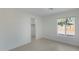 Spacious bedroom with large window and closet at 6934 W Mclellan Rd, Glendale, AZ 85303