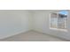 Bright bedroom with large window and tile flooring at 6934 W Mclellan Rd, Glendale, AZ 85303