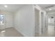 Bright and airy entryway with tile flooring and access to closets at 6934 W Mclellan Rd, Glendale, AZ 85303