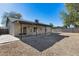 Back exterior view of house with covered patio at 6934 W Mclellan Rd, Glendale, AZ 85303