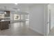 Modern kitchen with island, stainless steel appliances, and tile floors at 6934 W Mclellan Rd, Glendale, AZ 85303
