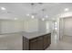 Kitchen island with granite countertop and modern cabinetry at 6934 W Mclellan Rd, Glendale, AZ 85303