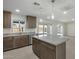 Modern kitchen featuring granite countertops and stainless steel appliances at 6934 W Mclellan Rd, Glendale, AZ 85303